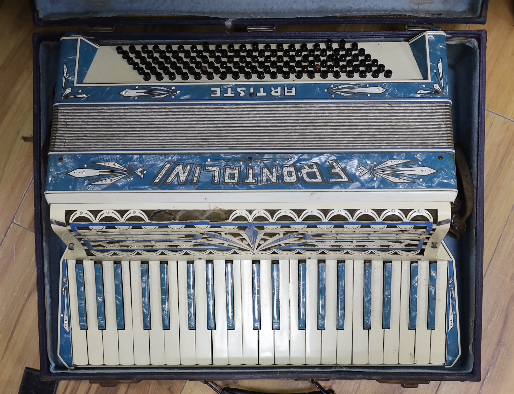 A Frontalini accordion, cased